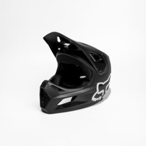 Full-face helmet, mountain bike helmet, black featuring a white Fox logo against a plain white background.
