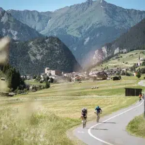 Cycle the Three Countries Giro road bike tour along a smoothly paved route winding through a stunning alpine valley.