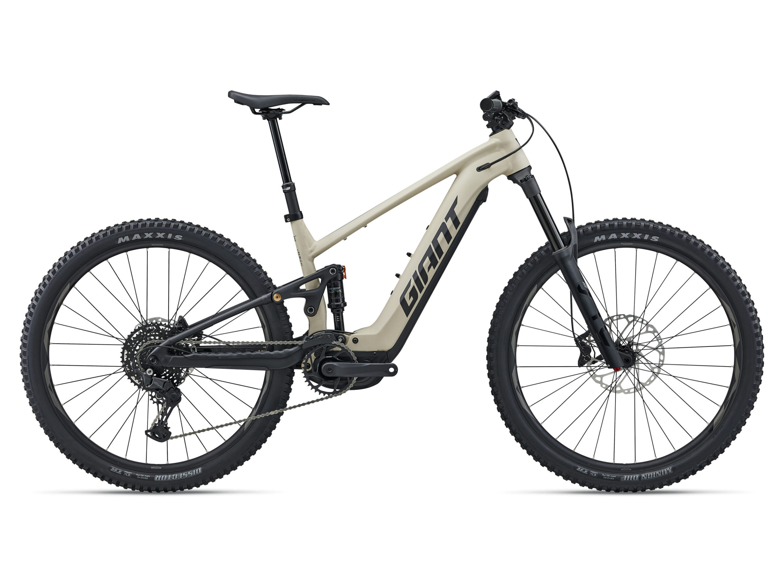 Beige-schwarzes Giant Stance E+ 1 E-Mountainbike mit breiten Reifen und auffälligem Logo.